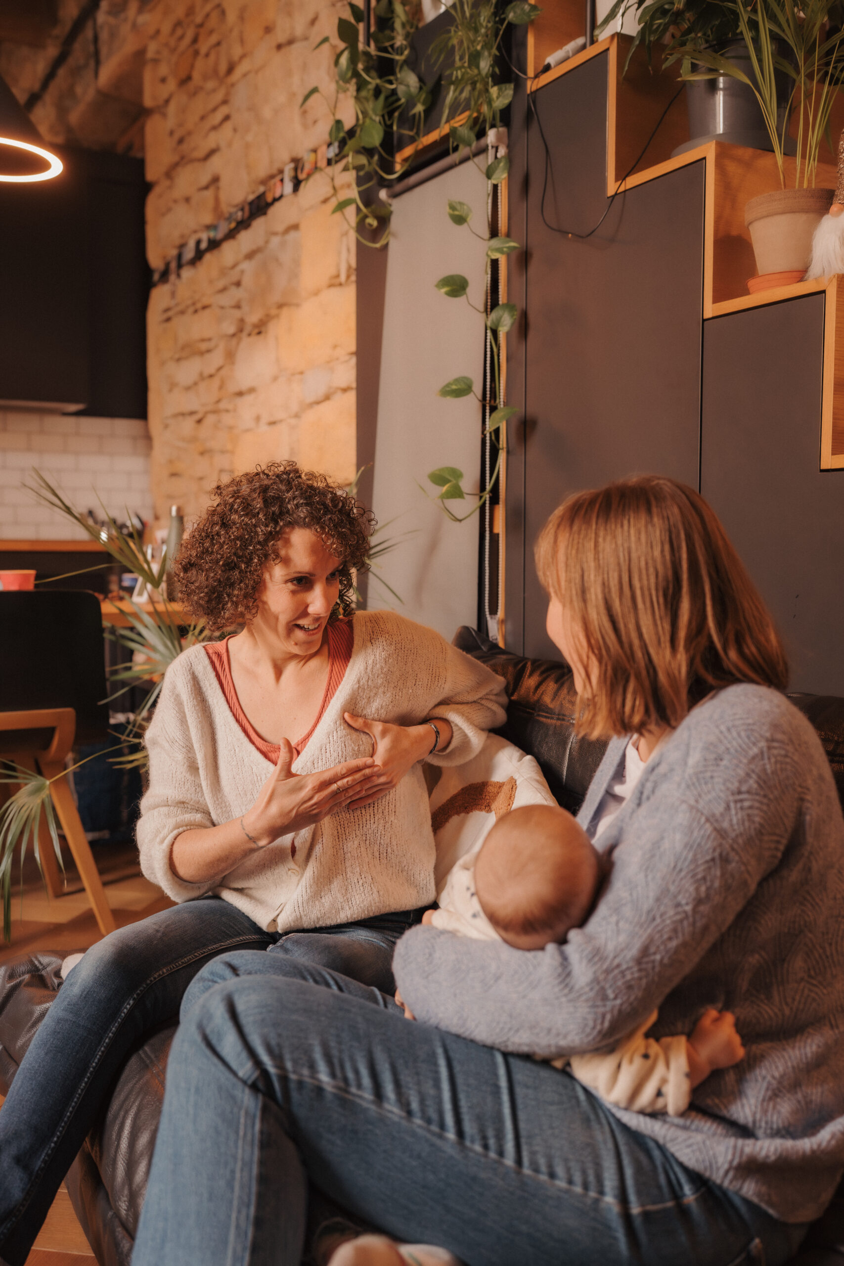 baby lying on white bed